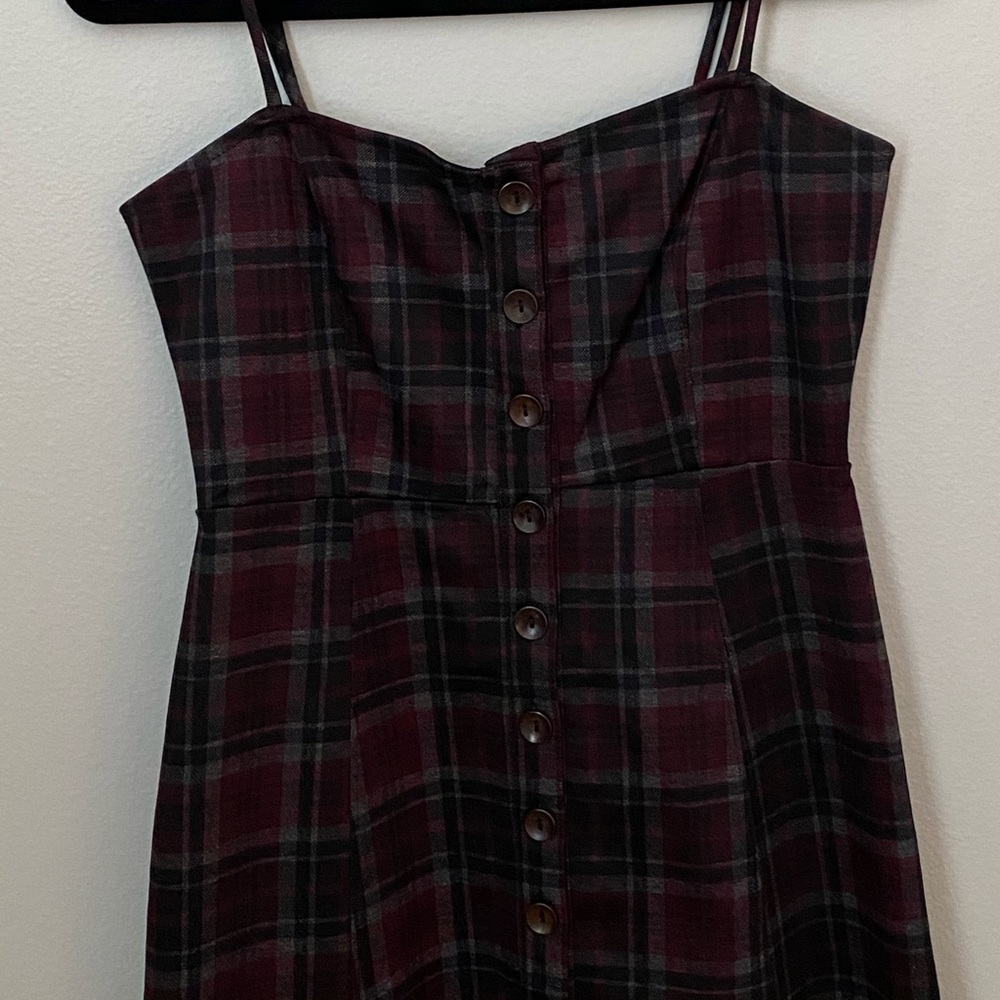Plaid dress worn once in new condition.